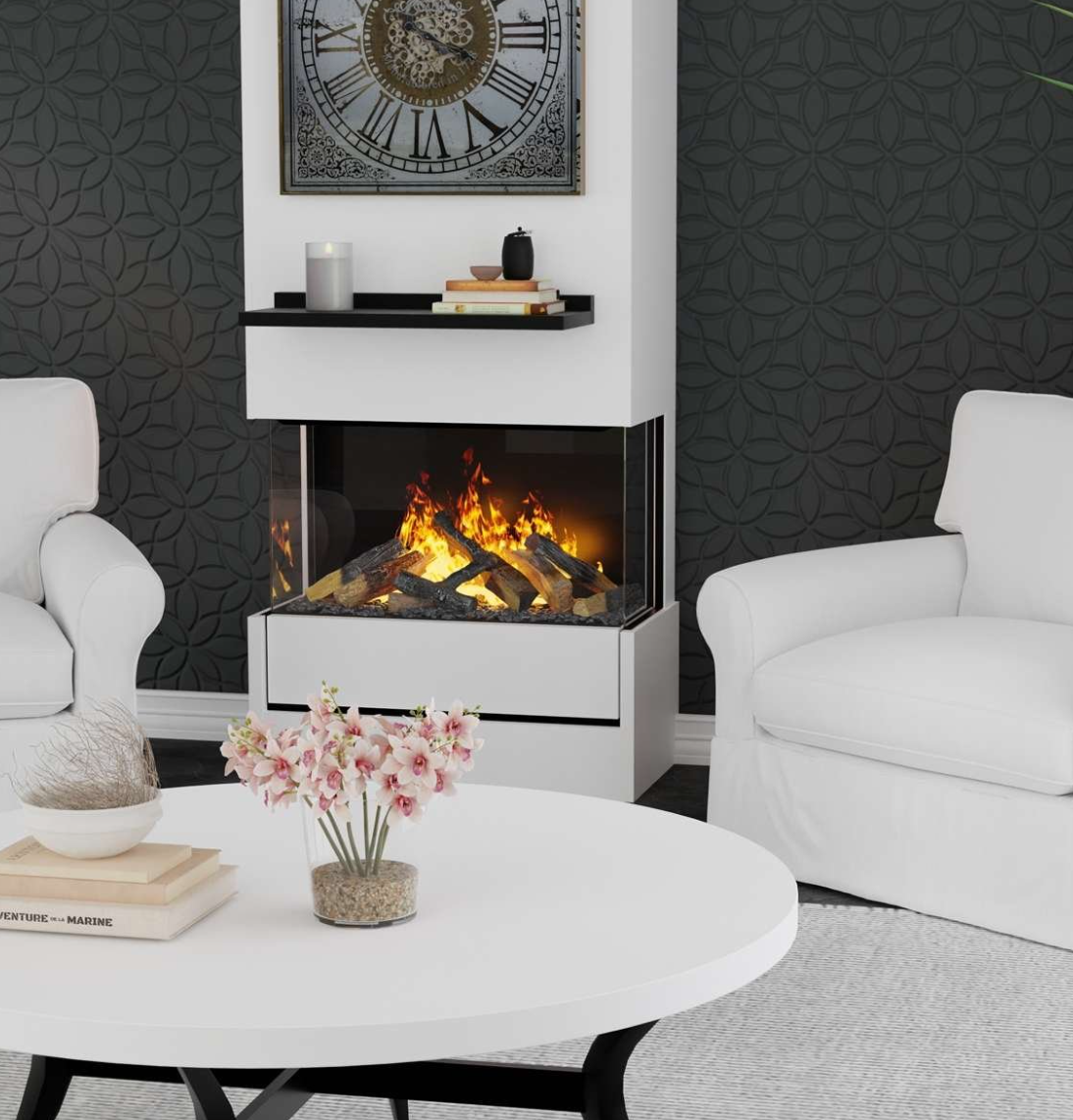 A modern white electric fireplace insert with a realistic flame effect, set in a living room between two white armchairs and a round white coffee table.