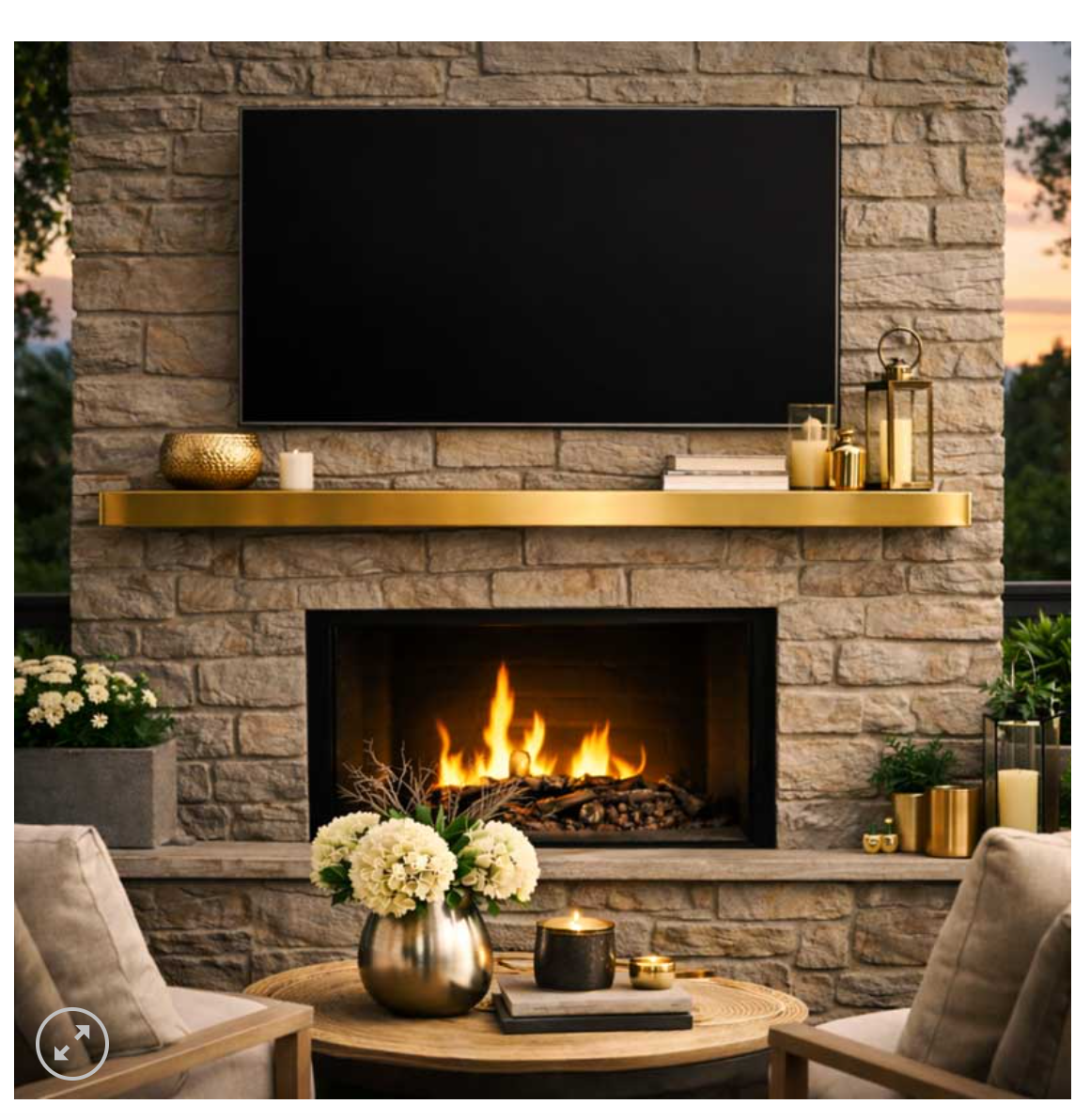 brass shelf mantel above fireplace in living room with chairs table and a tv