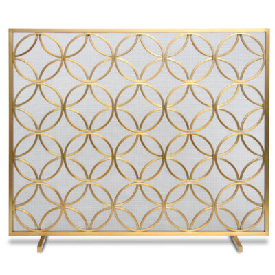 Gold metal fireplace screen with a repeating interlocking circle pattern over a white mesh background, supported by two small gold legs.