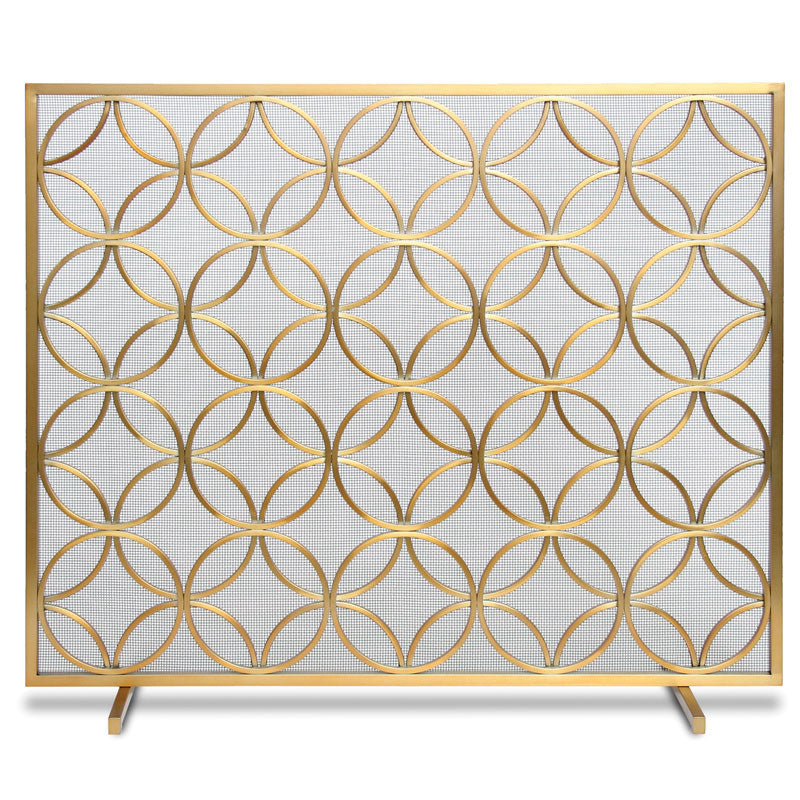 Detailed closeup of gold freestanding fireplace screen