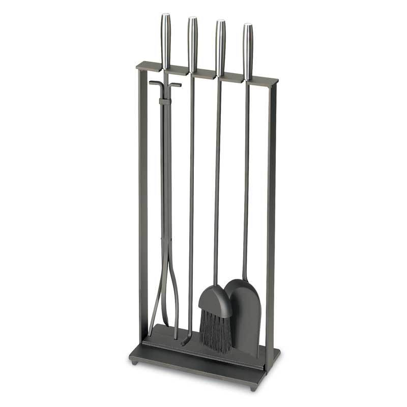 Set of fireplace tools including a poker, brush, and tongs in a black stand on a white background.