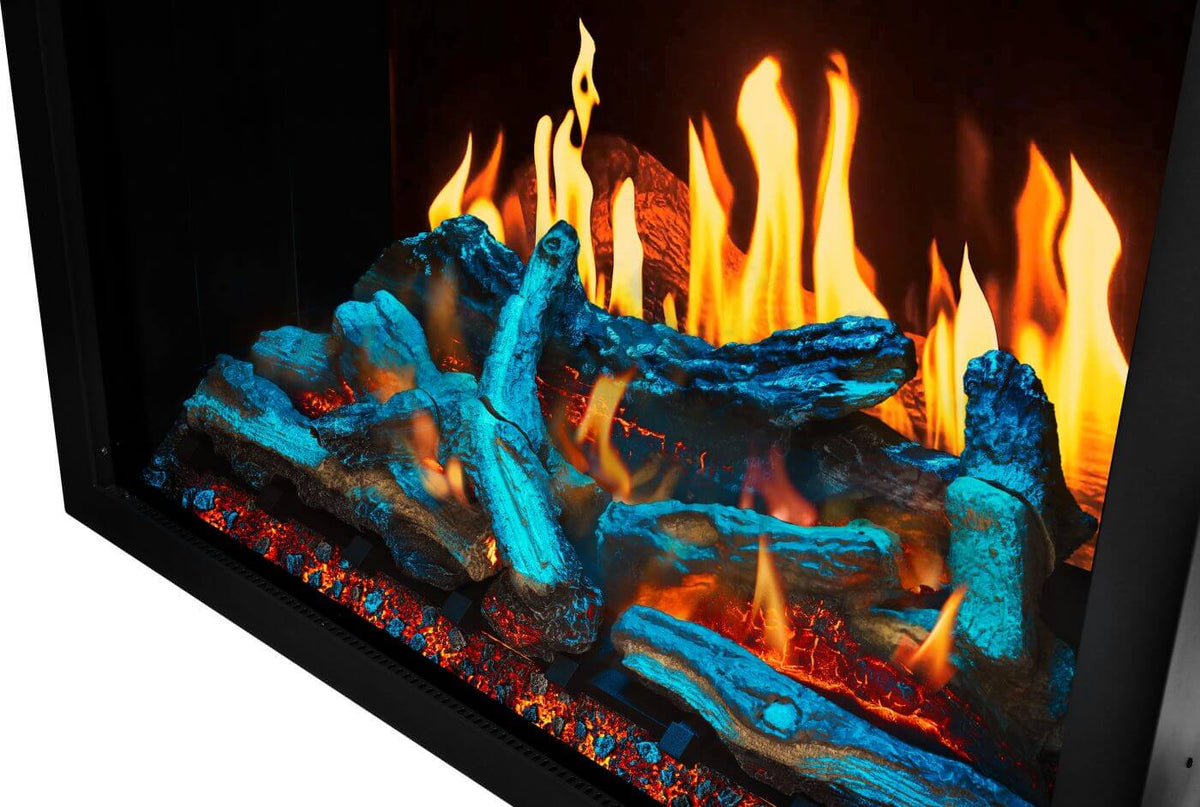 Close-up of a fireplace with glowing blue logs and orange flames.