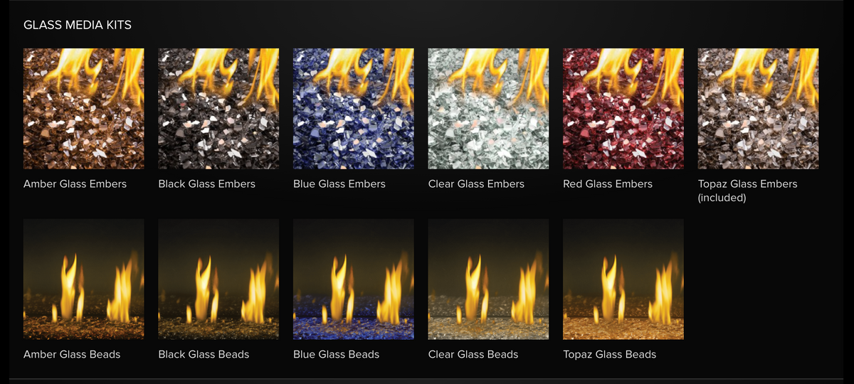 A product comparison chart showing different glass ember and bead kits for fire pits, arranged in two rows on a black background. The top row shows amber, black, blue, clear, red, and topaz glass embers, and the bottom row shows amber, black, blue, clear, and topaz glass beads, each with flame graphics above it.