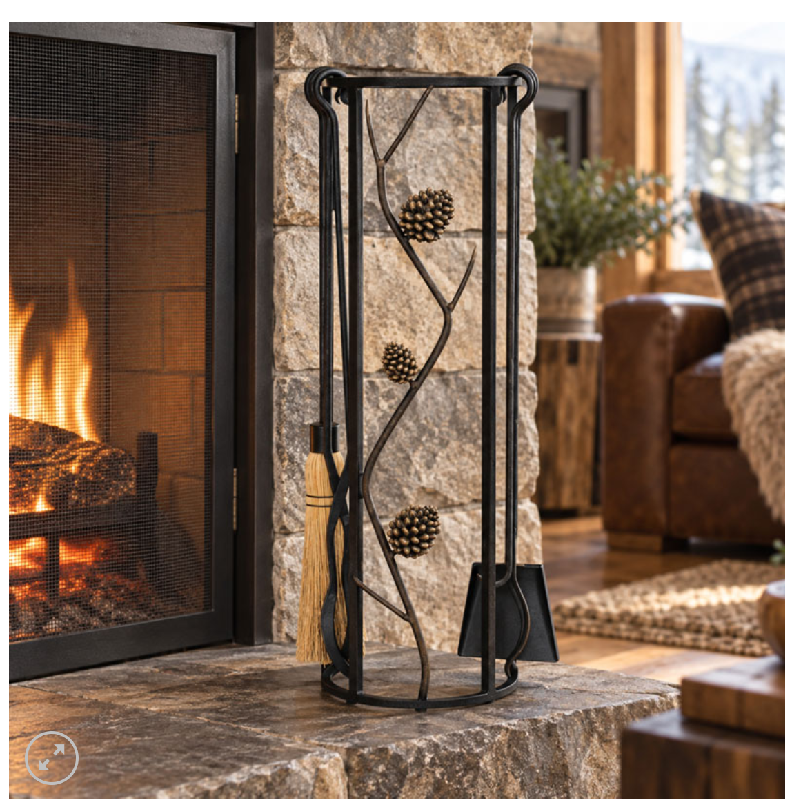 Pine Cone toolset shown in front of a stone fireplace with a fire burning in the living room