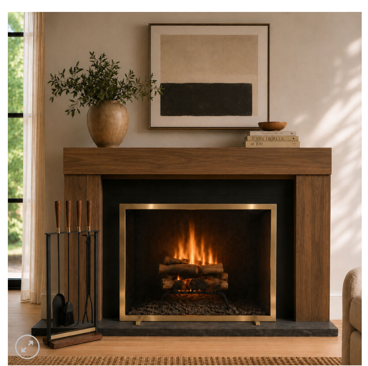 shows fireplace tool set and a screen in front of a brown surround burning fireplace