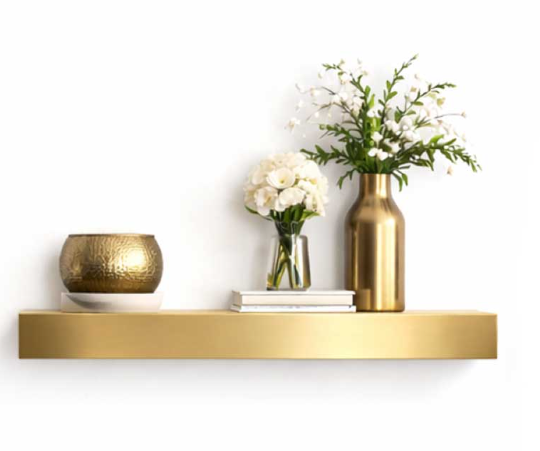 Brass shelf with flowers and vase on shelf with white background