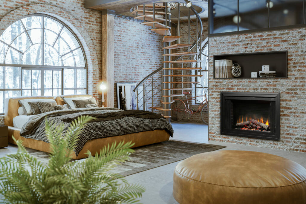 bedroom with firebox built into stone wall witha shelf above it
