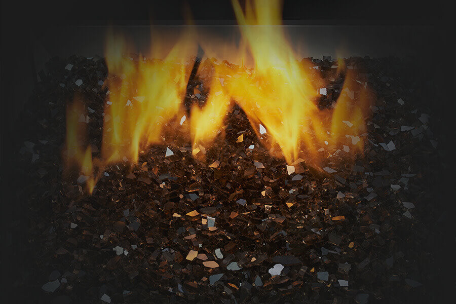 Fire pit with flames burning on a dark background
