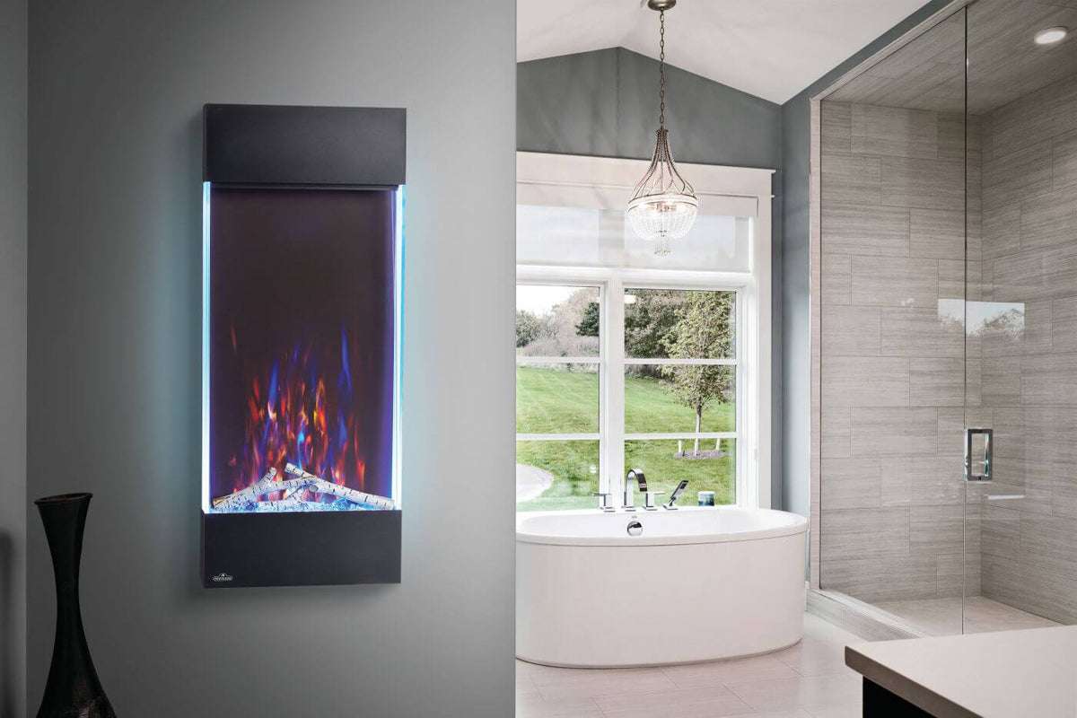 Modern bathroom with a wall-mounted electric fireplace and a bathtub.