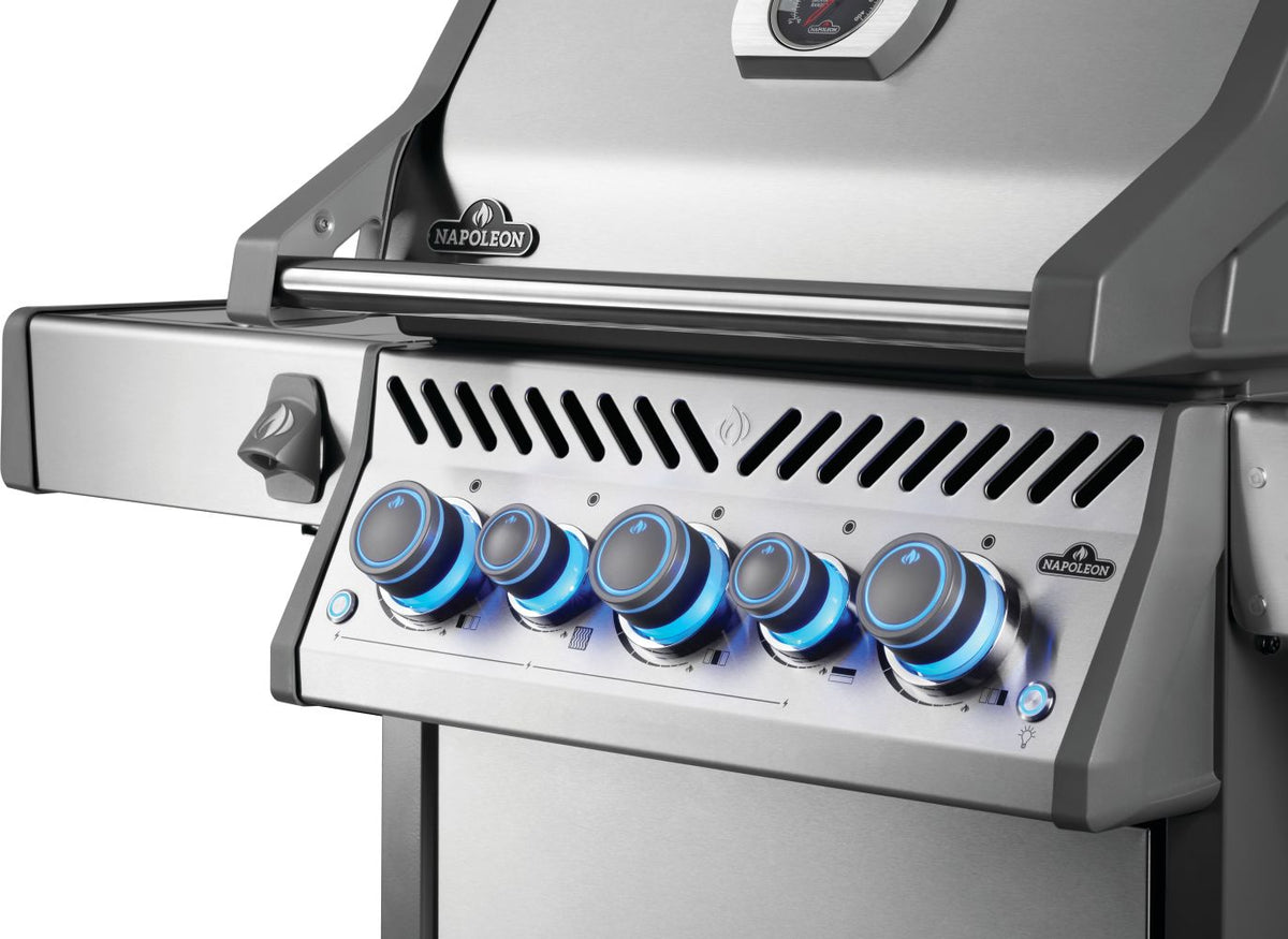 Napoleon gas grill with control knobs on a white background